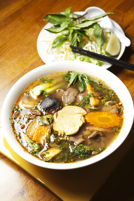 If the looks of the beef are intentionally deceiving, there's no misdirection in the broth bowl. The adobe-red soup looks primed to claw the tongue with peppery spice, and it pounces on first spoonful. The heat has subtle tropical fruit accents, but they'll only be noticed by eaters who regularly plead with servers to let them go beyond five-star heat. Not counting the dishes I've destroyed with chili oil and Sriracha, Blossom's bun was one of the hottest dishes I've had in Seattle.