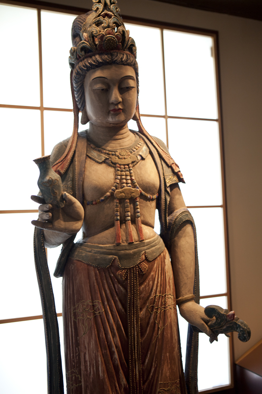 A large statue of Guanyin looks over the dinning room. Guanyin is the bodhisattva (enlightenment-being) associated with compassion. In English she is commonly known as the Mercy Goddess or Goddess of Mercy.