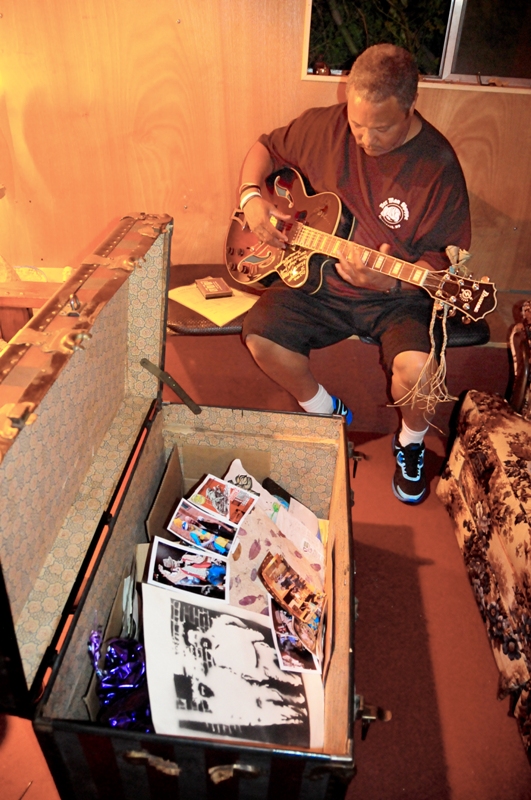 The trunk in the center of the room is filled with memorabilia, notes and cards.