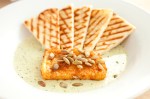 Rodriguez serves a perfect rectangle of spongy Mexican cheese, coated in panko bread crumbs and fried to a crisp, flaxen finish. The cheese and four grill-marked pita triangles are painstakingly positioned in an Easter egg-green cilantro and pumpkin seed cream sauce.