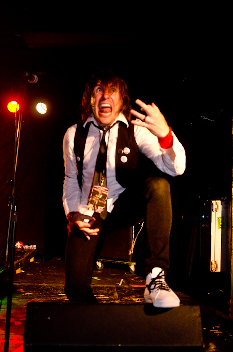 Hot Lixx Hulahan, Judge, and 2008 Air Guitar World Champion opening the show with a performance.