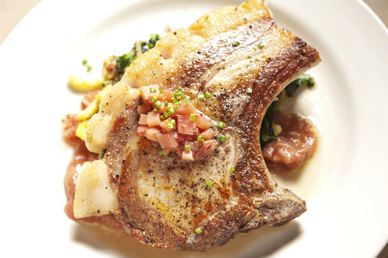 The pork chop with spaetzle, spring kale, and rhubarb from La Boucherie.