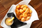 With the popcorn shrimp, the shrimp are watery plugs ofnothingness. An accompanying waxy honey mustard dressing that really should be in a relationship with a different appetizer doesn't help much.
