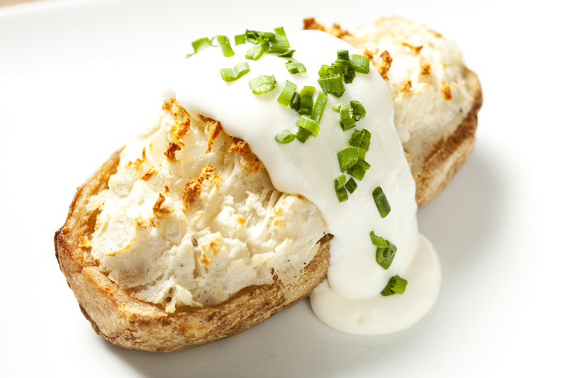 To make its baked potato, Manhattan Drugs hollows out a potato and blends its innards with a modicum of butter, sour cream and chives. The resulting nubbins are then returned to the hard-baked shell, like parched pebbles in a dry creek bed. Both times I tried the flavorless potato, it was served at what might be considered room temperature if a large man was controlling the thermostat.