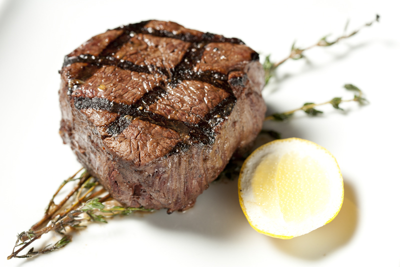 So how's the steak? The filet's lifeless, but the strip and rib eye are threaded with fat, and both were cooked as requested.