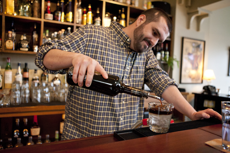Bartender Joe making the Corn N' Oil.