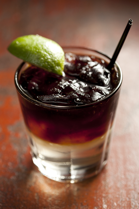 Corn N' Oil - Black Strap Rum, Falernum (Caribbean lime/rum/ginger liqueur) fresh lemon juice.