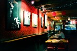 At the Sunset Tavern in Ballard the walls are painted bright red to create a hip vibe.