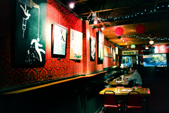 At the Sunset Tavern in Ballard the walls are painted bright red to create a hip vibe.