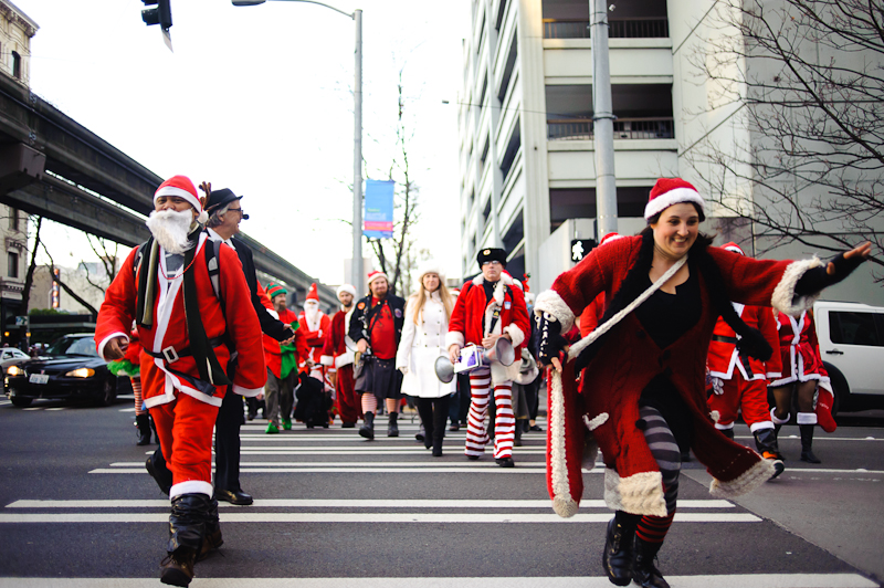 More holiday garbed individuals make the walk through Downtown.