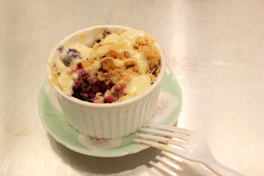 Berry Cobbler with Vanilla Custard, made by Carry.  Carry loves to cook comfort food. Her grandmother taught her how to cook pies at a young age.  She loves to utilize local farmers markets in her cooking.  It makes her feel good to know where her food is coming from.