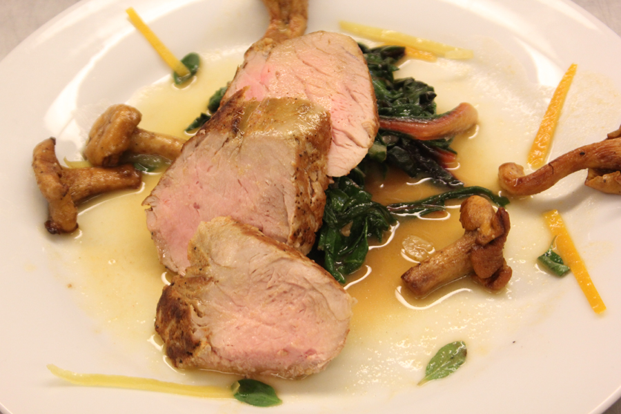 Pork Tenderloin w/ sauteed swiss chard chanterellel mushrooms, by Michael.Michael hasnaE™t cooked this dish before.  In fact, he hadnaE™t even tasted it by the time I took this picture.