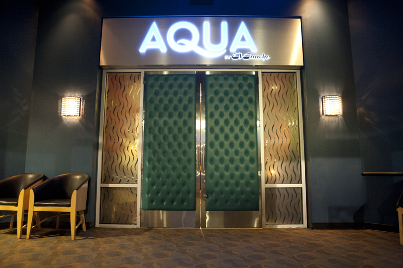 The restaurant's musty aesthetics are apparent just inside theentryway, fronted by a pair of padded seafoam green vinyl doors.