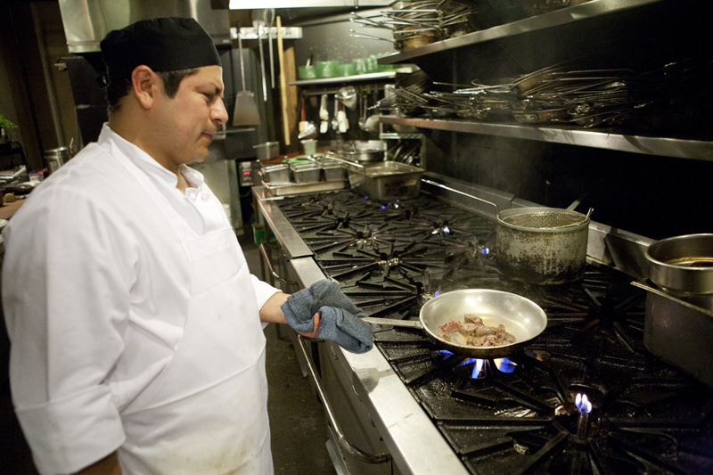 Cook Ivan starts cooking the tenderloin diablo