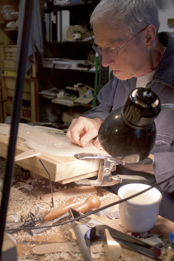 Doug Yule works on violins inside his workspace on Nov. 11, 2011.