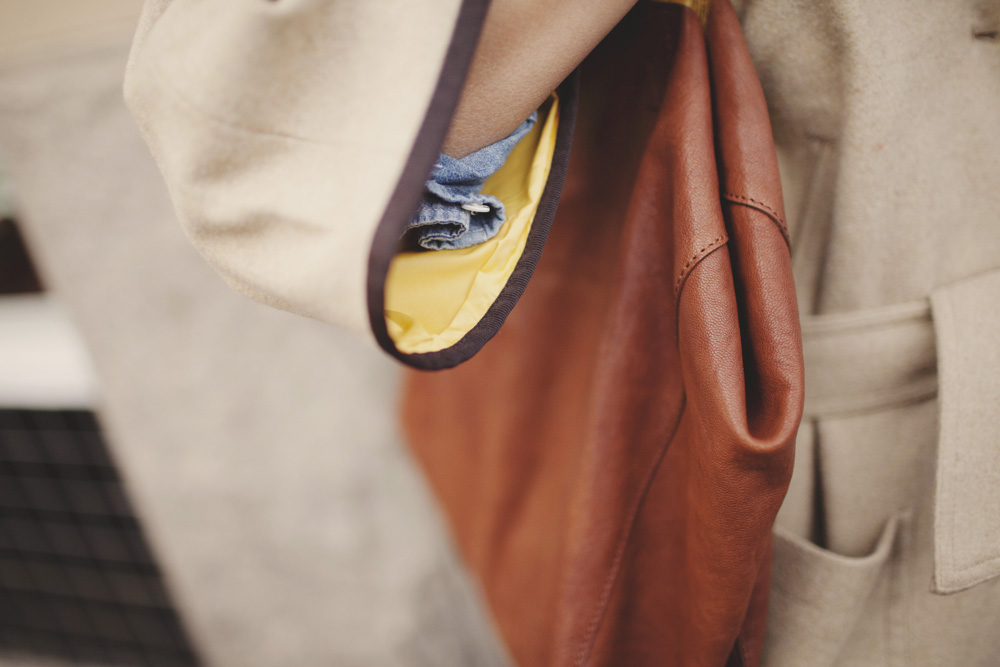 Chou Ha Ma is a New York transplant currently in Seattle working as a designer for Eddie Bauer. She picked up her Woolrich coat from Anthropologie and her glasses from Ici Berlin.