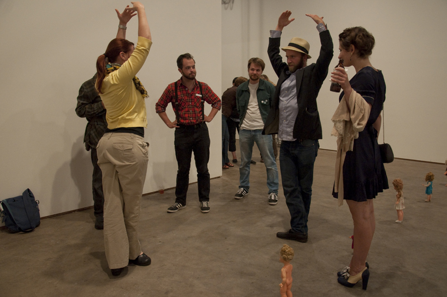 Rachael Faust and Sean McElroy practice their ballet positions.