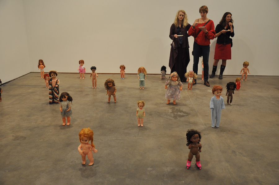 Colleen, Emily, and fellow SU student Kristina Moravec take in the exhibit over some hors d'oeuvres.