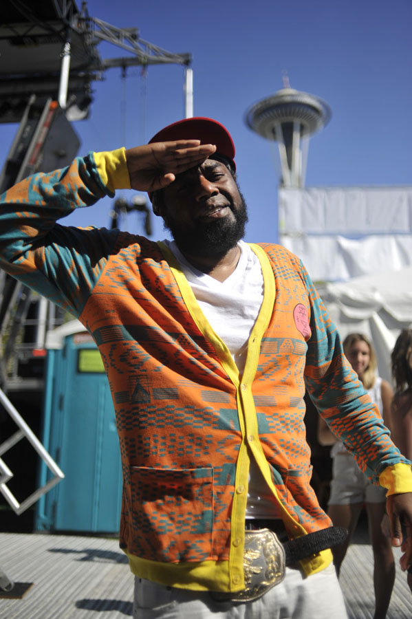 Artist Tilson rocks the gold fanny pack like no other.