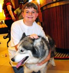 The Maxwell Hotel is named for Max Barnett, here with his Siberian Husky Kiska.