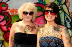 Mercedes Costelloe and Brandi Duval show their tattoos.