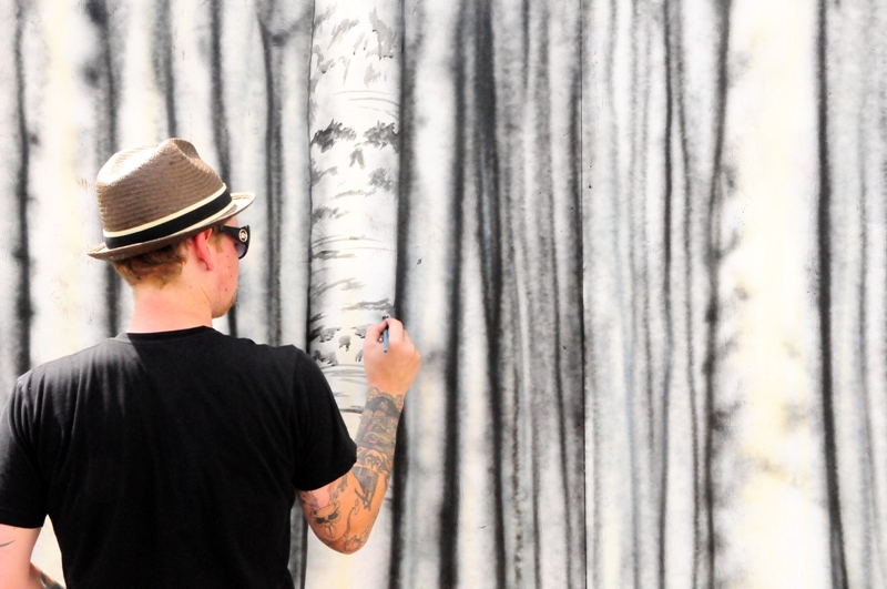 Joe Vollan creates a landscape.