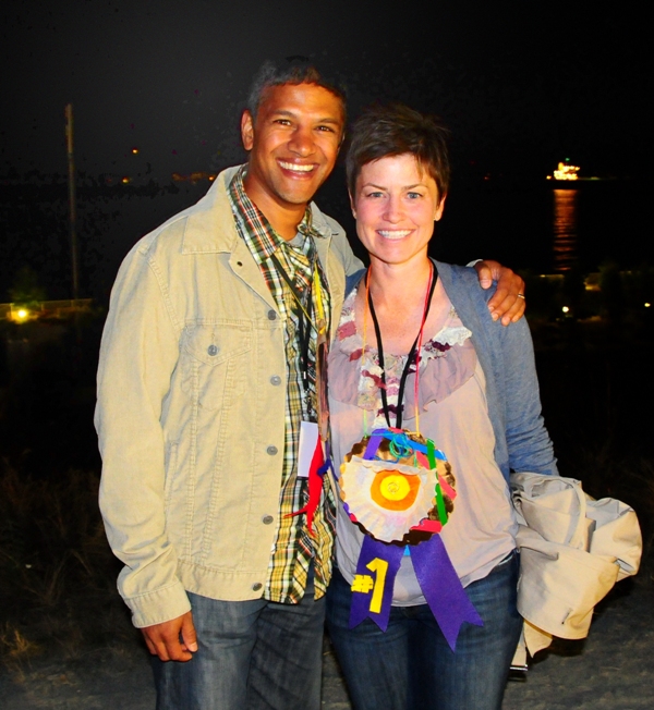 Amit Mehta and Rebecca Gerben show off the blue ribbon medals they made at REMIX.