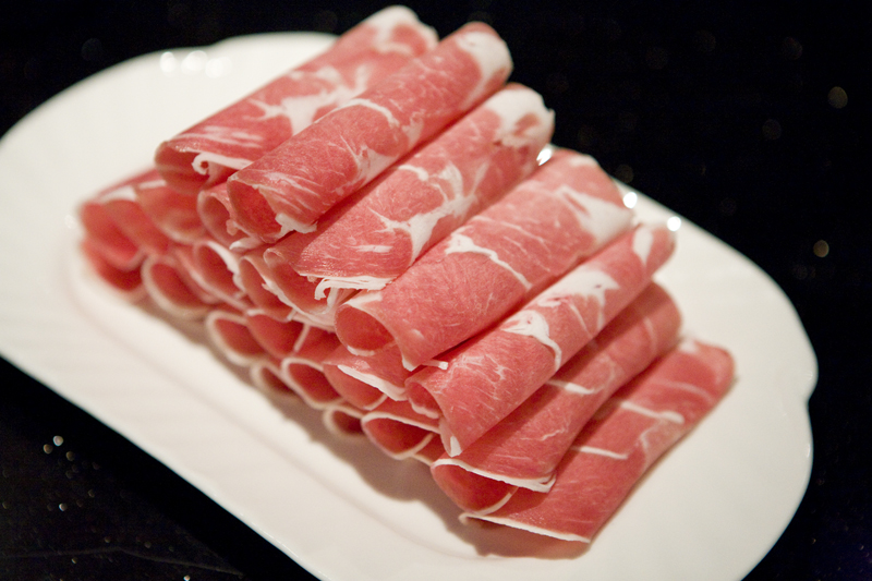 Sliced lamb shoulder. Its best to start with the lamb and other meats, to build a stock to the soup says, Steve Yang. Mr. Yang is the regional manager for Little Sheep's North American operations.