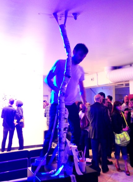 Ian Toms and Justin Lytle gradually added to their beer can tower installation as they finished up rounds of beer pong.