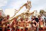 Golden gods celebrating during the Miami Beach Gay Pride Parade.