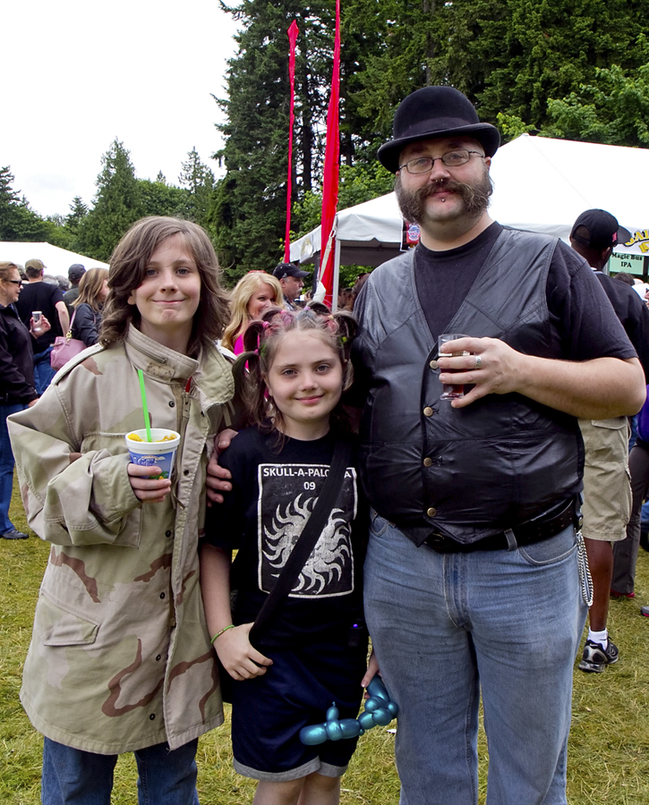 Timothy, Ceridwen and Joshua Books show the festival is fun for all generations.