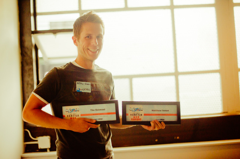 Matt Inman, the creative genius behind The Oatmeal, with his Readers' Choice awards for Seattle's Favorite Online Time Waster and Seattle's Sexiest Geek.