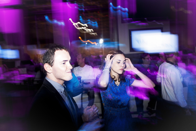 Alexandra Reveyrann, a SIFF intern from France dances with a fellow intern during the gay-la.