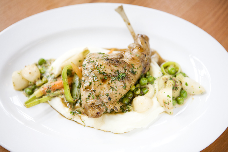 Braised rabbit with spring vegetables, potato puree, mustard.
