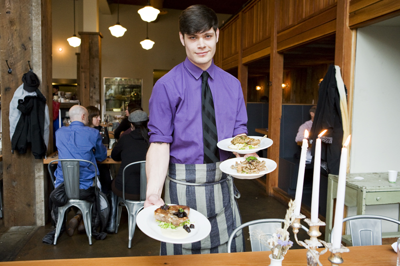 Waiter Lucas Werdal delivers the goods.