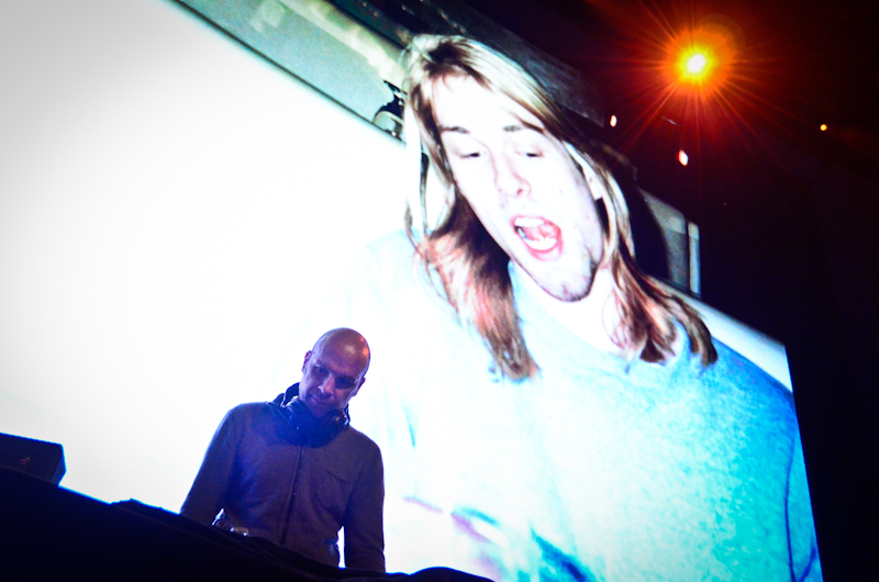 Charles Peterson (Grunge Era Photographer) DJ'd for a while while making sure to take some photographs from the stage.