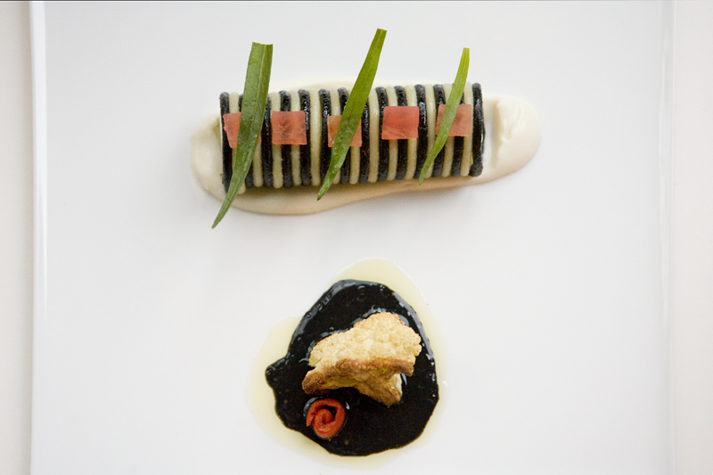 Scallop Mousse with Squid ink spaghetti, cauliflower, tarragon and tomato.