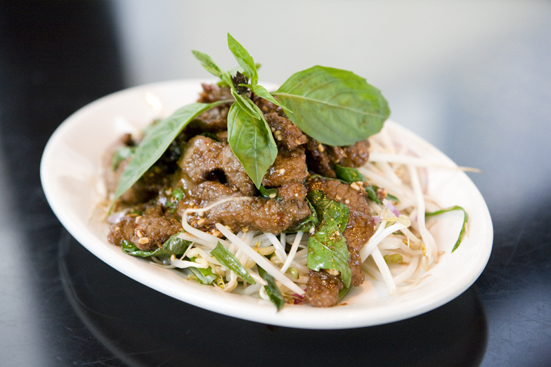 Flank steak, fragrant, with the seven flavors of lemongrass, peanuts, hoisin, chilies, basil, garlic and ginger is quickly wok-fried resulting in a complex intense flavor.