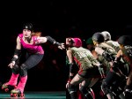 A skater from Guns and Rollers and the RCRG's own Derby Liberation front.