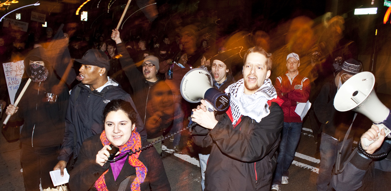 Protesters lead group chants.