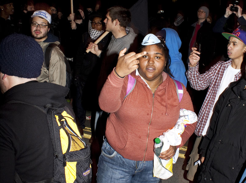 Many protesters were outwardly aggressive to the press. Calling them snitches, blocking cameras with flags, threatening violence,  attempting to steal equipment, and even threatening to use their flag poles as weapons.