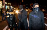 Phoenix Jones and his colleagues were seen trying to de escalate confrontations between the police and the protesters.