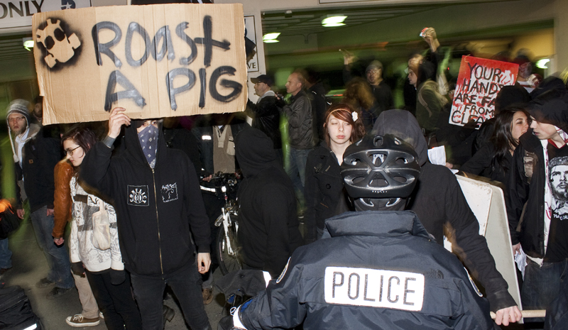 Shot taken several seconds before police spray protesters with pepper spray.