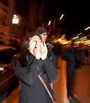 A woman yells at the police line on Capitol Hill near the precinct.