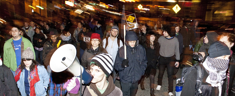 View of the procession coming down the street.