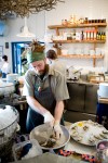 Cook Anthony Pane works on oysters.