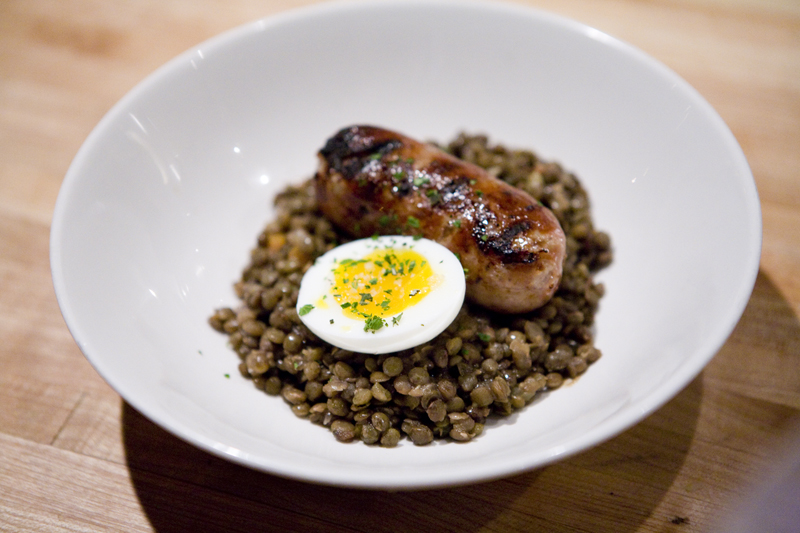 Lentils with sausage and egg.