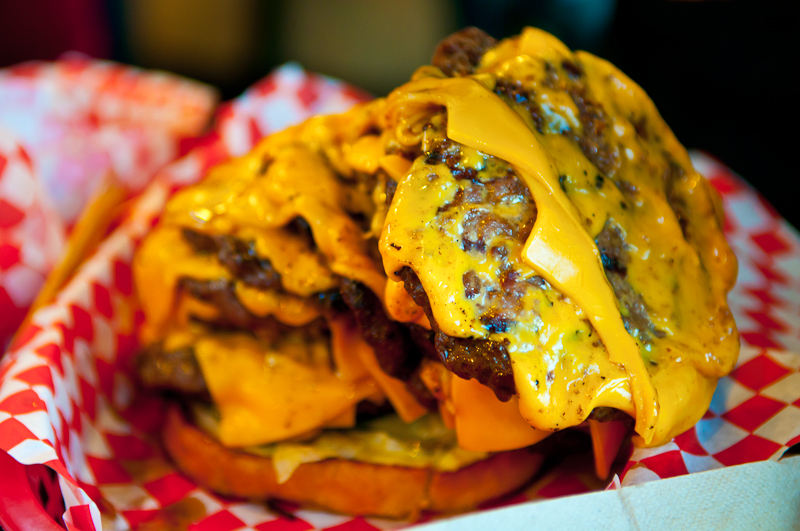 In October, Seattle Weekly's own Mike Seely attempted to complete the burger madness challenge - eating a 12-patty burger - at the aptly named Burger Madness.