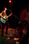 Carrie Brownstein sings to a sold out High Dive.