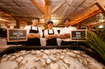 Shucker chefs. Over 23,000 oysters were shucked for the event.